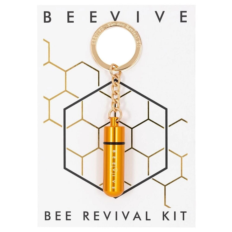 gold coloured bee saving keyring