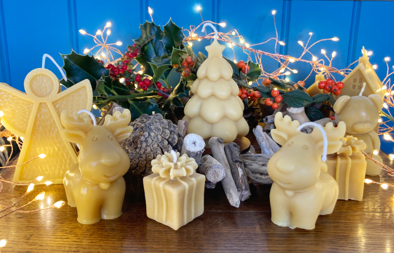 christmas themed ornamental candles perfect for table decorations