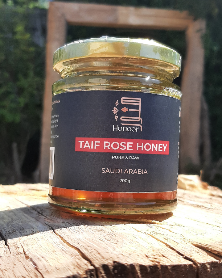 Taif rose honey jar in sunlight