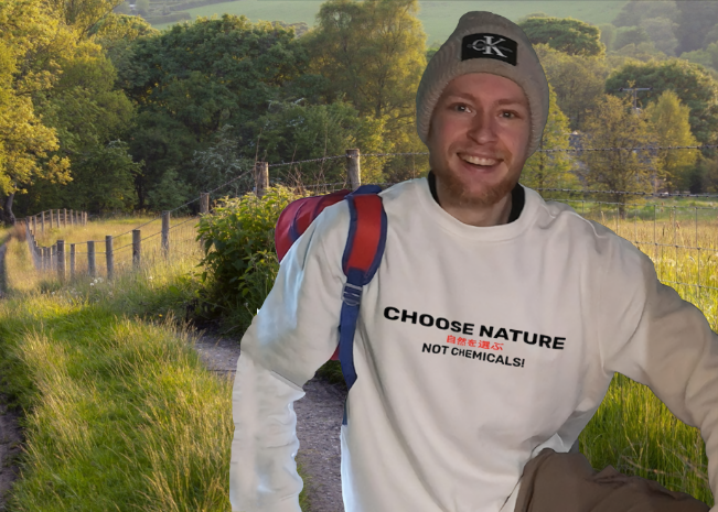 Man on walk in countryside wearing choose nature sweatshirt